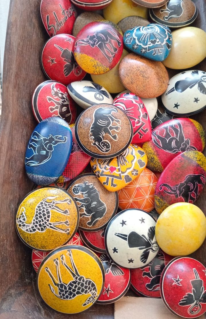 Vibrant Decorative Stones in Wooden Bowl